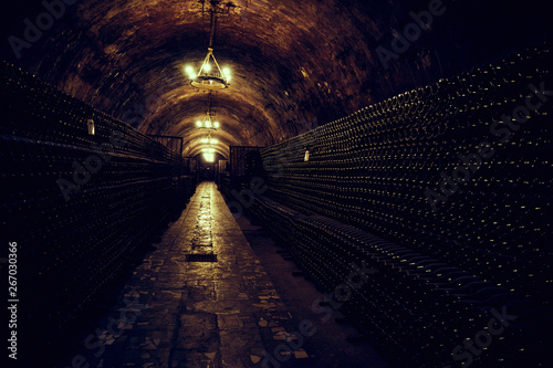 An image of an underground tunnel for aging wine.