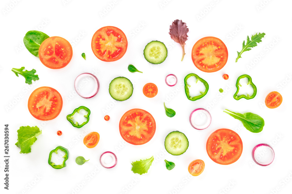 Fresh vegetable salad ingredients, shot from above on a white background. A flat lay composition with tomato, cucumber, peppers, onion slices and mezclun leaves Fresh vegetable salad ingredients, shot from above on a white background. A flat lay composition with tomato, cucumber, peppers, onion slices and mezclun leaves