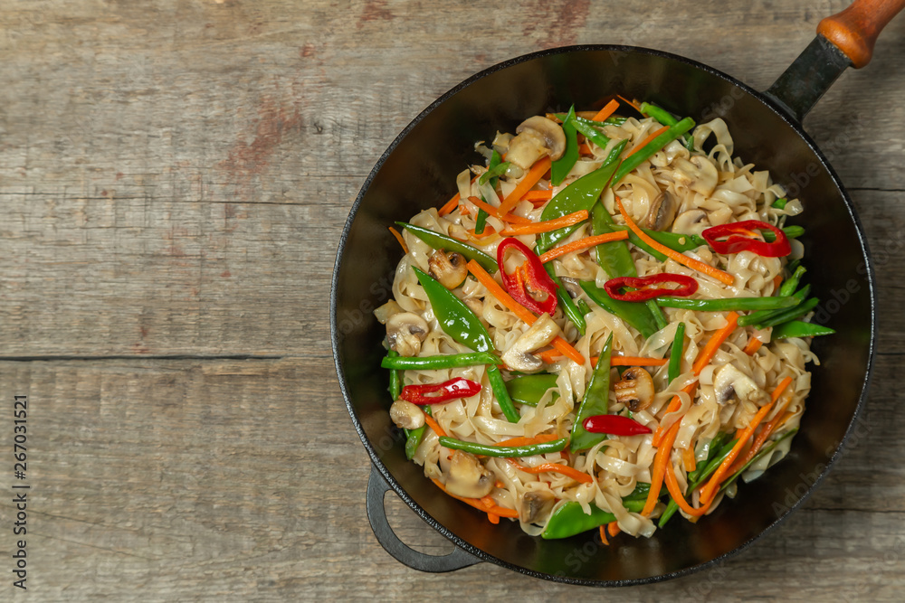 Chow Mein egg noodles with vegetables and mushrooms. The view from the top. Copy-space Chow Mein egg noodles with vegetables and mushrooms. The view from the top. Copy-space