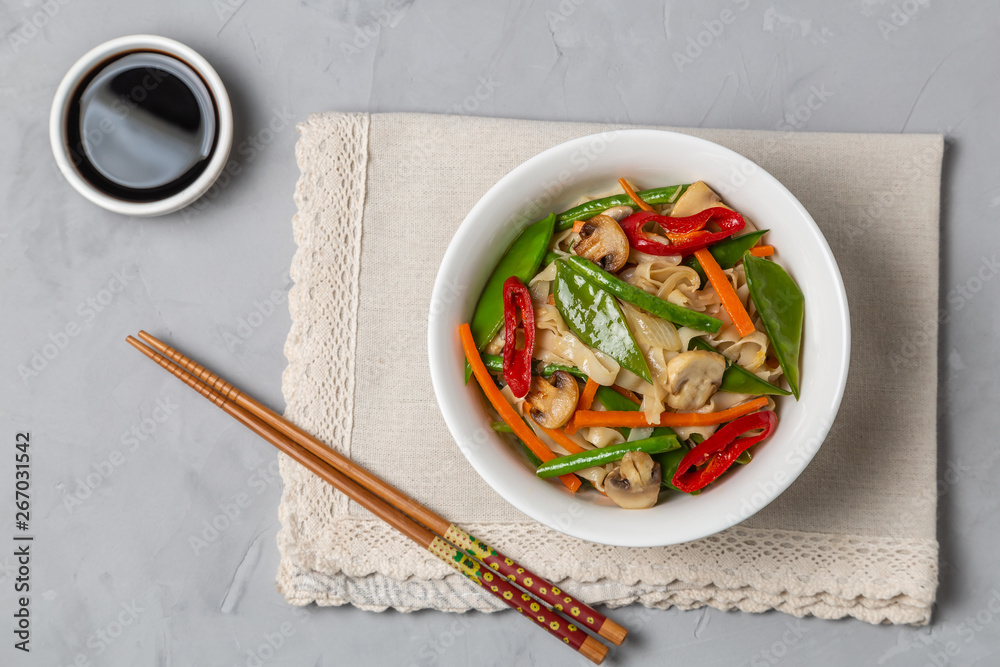 Chow Mein egg noodles with vegetables and mushrooms. The view from the top. Copy-space Chow Mein egg noodles with vegetables and mushrooms. The view from the top. Copy-space