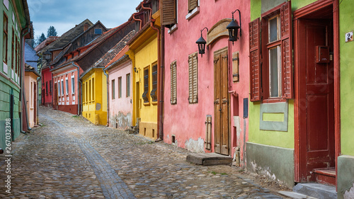 Cityscape of colorful street in old town Sighisoara, Romania
