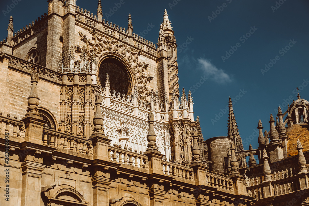 Gothic exterior of the Cathedral of Saint Mary of the See Seville Cathedral in Seville, Andalusia, Spain