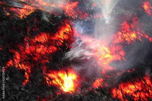 Fotografia Fire sparks black background, burn effect, burning fire and smoke, sparks fire background