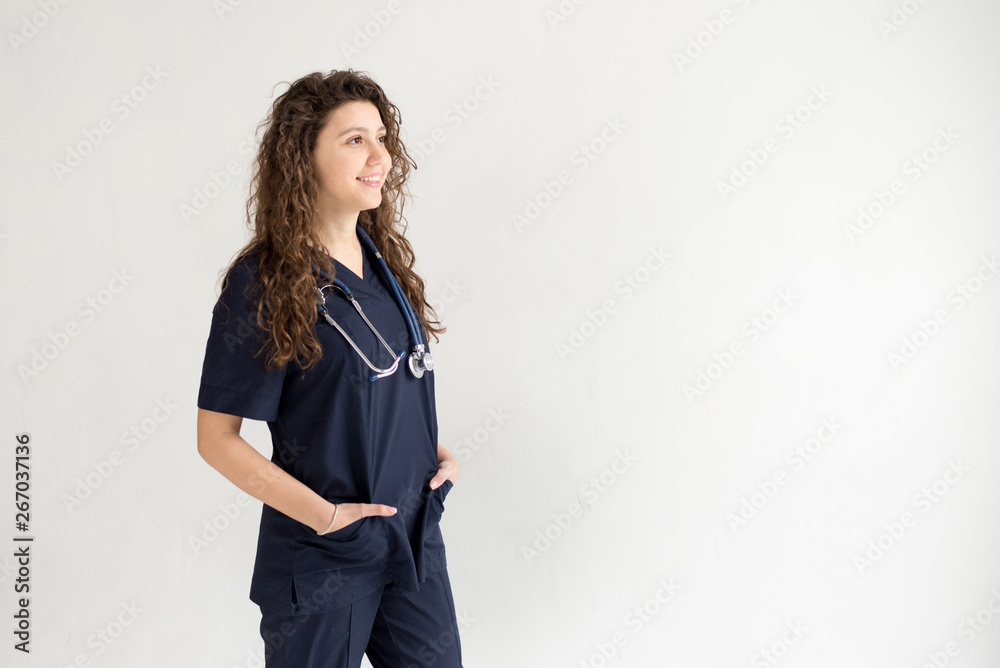 Medical concept of young beautiful female doctor with phonendoscope. Woman hospital worker, studio, white background with copy space Medical concept of young beautiful female doctor with phonendoscope. Woman hospital worker, studio, white background with copy space