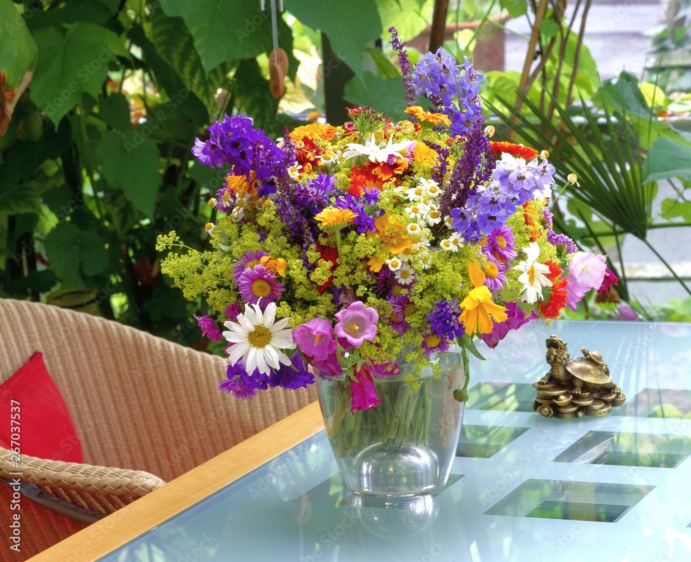 Fototapeta premium Vibrant Summer Wildflowers in Sunlit Conservatory