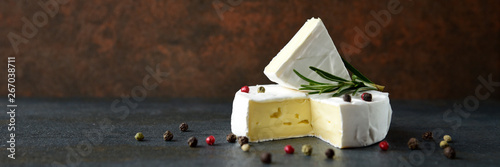 Cheese camembert or brie with fresh rosemary photo