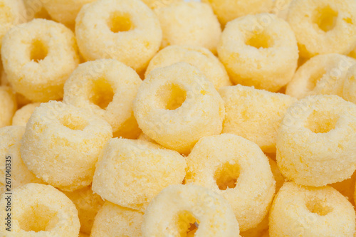 Close up pile of corn ring snack, shots in studio.