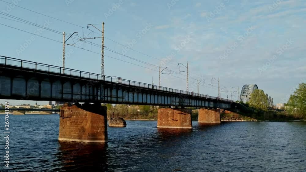 Famous Iron Bridge and Daugava river in the capital city of Riga in Baltic States. Famous Iron Bridge and Daugava river in the capital city of Riga in Baltic States.