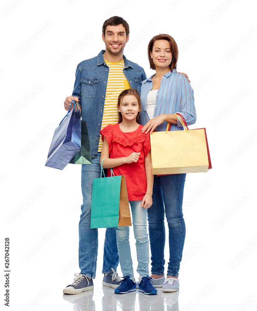 family, sale and people concept - happy smiling mother, father and little daughter with shopping bags over white background family, sale and people concept - happy smiling mother, father and little daughter with shopping bags over white background