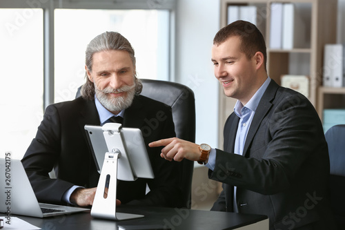 Two diverse businessmen col...