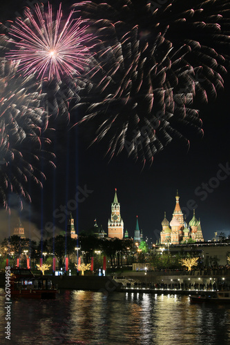 Beautiful evening view of the Moscow Kremlin and the holiday fireworks in the sky over Red Square  Russia