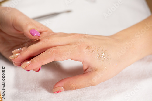 Wallpaper Mural Closeup view of hands with manicure of young woman Nail treatment by a specialist in the salon Torontodigital.ca
