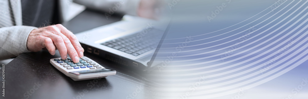 Hand of businessman using calculator. panoramic banner Hand of businessman using calculator. panoramic banner
