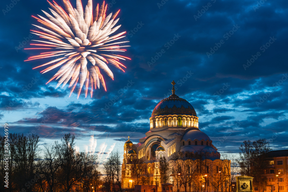 fireworks in the sky above the dome of St. Nicholas Cathedral in Kronstadt, St. Petersburg