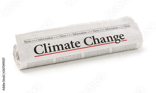 Rolled newspaper with the headline Climate change photo