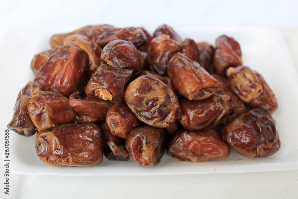 Date palm or fruit Kurma, named Ajwah which is delicious for the menu breaking the fast of Muslims Date palm or fruit Kurma, named Ajwah which is delicious for the menu breaking the fast of Muslims