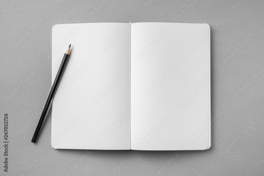 white notebook isolated on grey background white notebook isolated on grey background