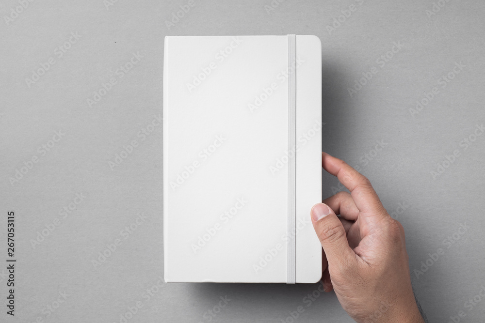 white notebook isolated on grey background white notebook isolated on grey background