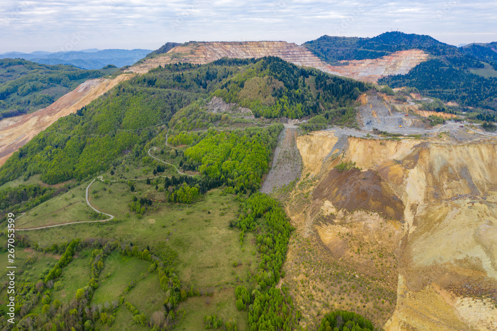 Aerial view of Rosia Poieni open pit copper mine Aerial view of Rosia Poieni open pit copper mine