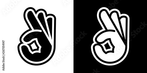 Stylized vector illustrations of human hand with OK sign; icons, isolated on white and black backgrounds. photo