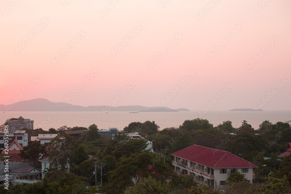 Sunset on the sea in a tropical city. Island vew. Sunset on the sea in a tropical city. Island vew.