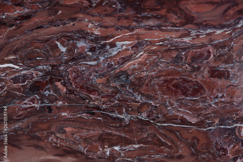Natural stone marble is red with white streaks, called quartzite Seqoia photo