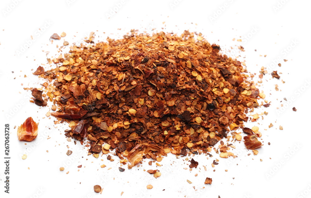 Crushed, ground dry pepper, spicy chopped paprika isolated on white background