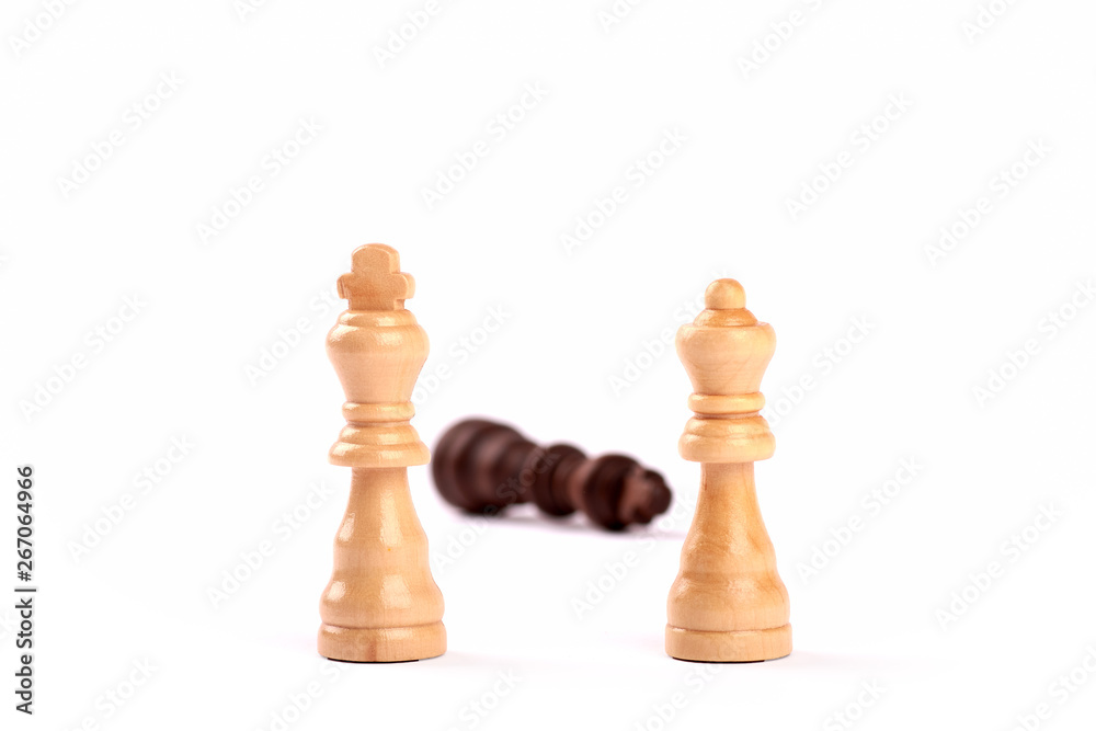 View of white and black checkers lady and king pieces. Defeated and winners in teamwork. Isolated on white background View of white and black checkers lady and king pieces. Defeated and winners in teamwork. Isolated on white background