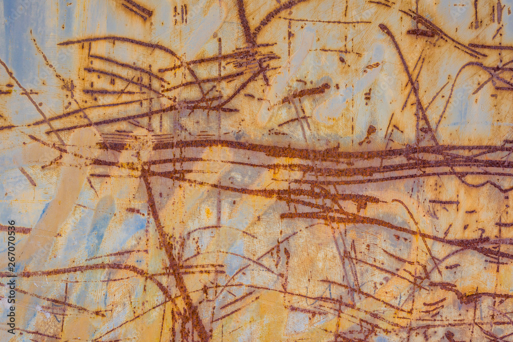 Obraz premium Old metal scratched background where the paint is already peeling off