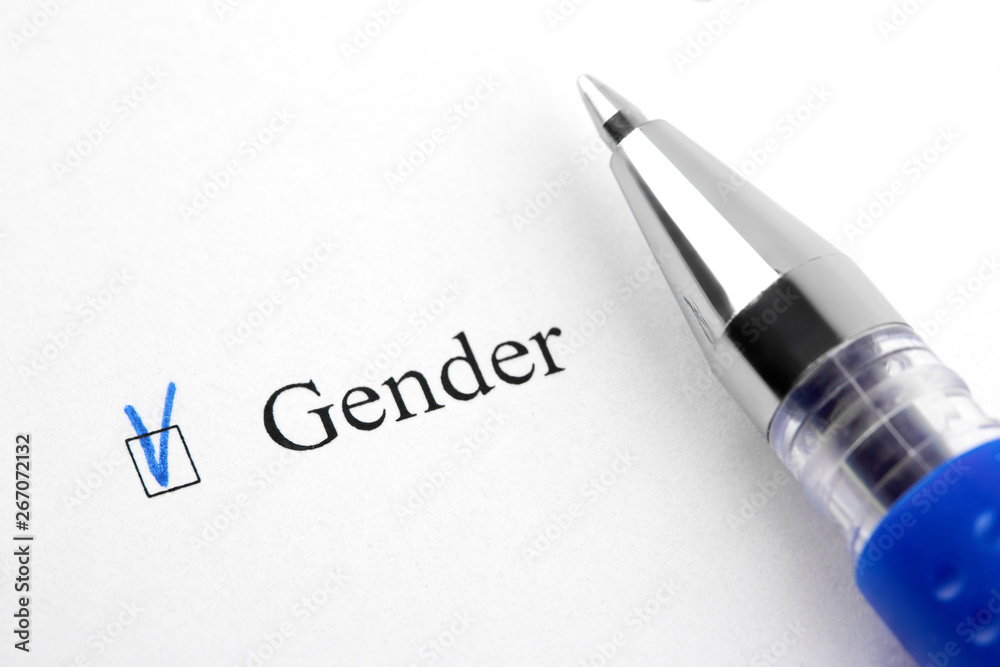 Gender. Filling in the questionnaire, documents. The checkboxes are filled with a black pen on a white background. Questionnaire, survey. Gender. Filling in the questionnaire, documents. The checkboxes are filled with a black pen on a white background. Questionnaire, survey.