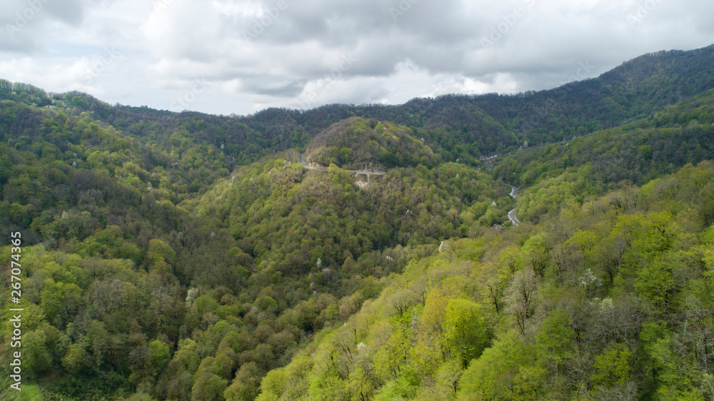 aerial view of serpentine road in a picturesque gorge of mountains