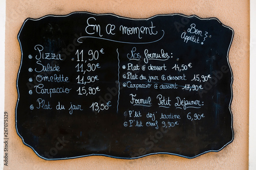 Blackboard handwritten menu outside a french restaurant