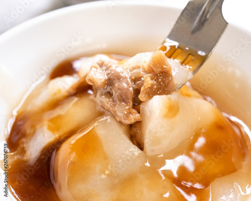 Bawan (Ba wan), taiwanese meatball delicacy, delicious street food, fried starch wrapped round shaped dumpling with pork inside, close up, copy space photo