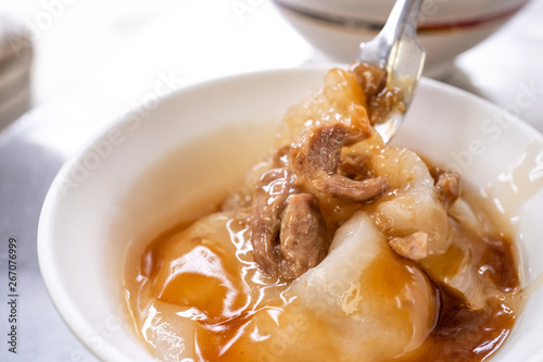 Bawan (Ba wan), taiwanese meatball delicacy, delicious street food, fried starch wrapped round shaped dumpling with pork inside, close up, copy space