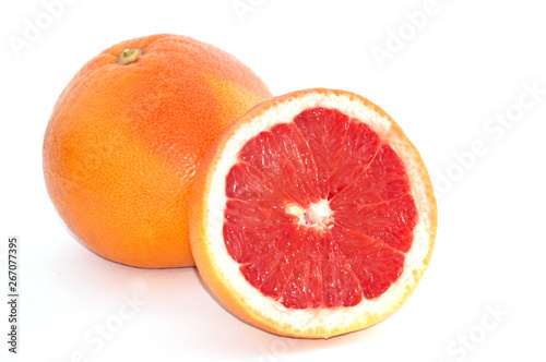 Ripe grapefruit on a white background close-up macro copy space