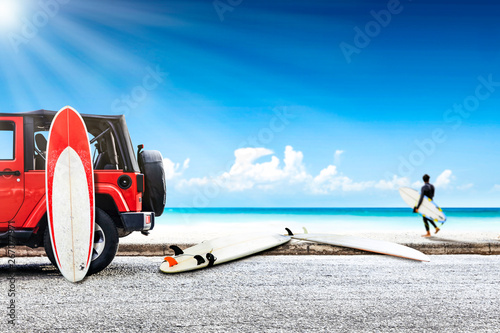 Red summer car and surfer on beach. Free space for your decoration and summer sunny day.  © magdal3na