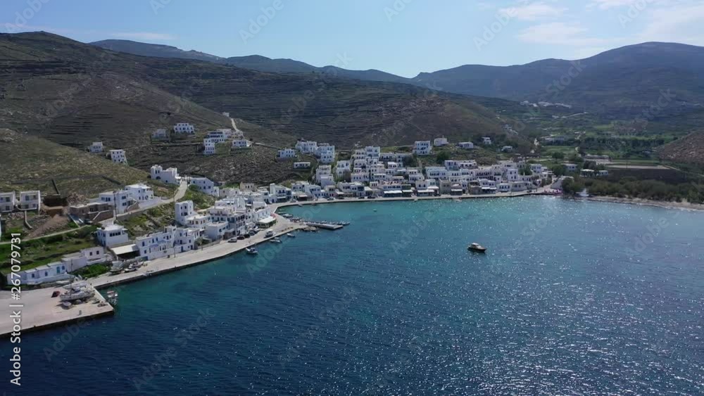 Aerial drone video of picturesque beautiful fishing village and small harbour of Panormos, Tinos island, Cyclades, Greece Aerial drone video of picturesque beautiful fishing village and small harbour of Panormos, Tinos island, Cyclades, Greece