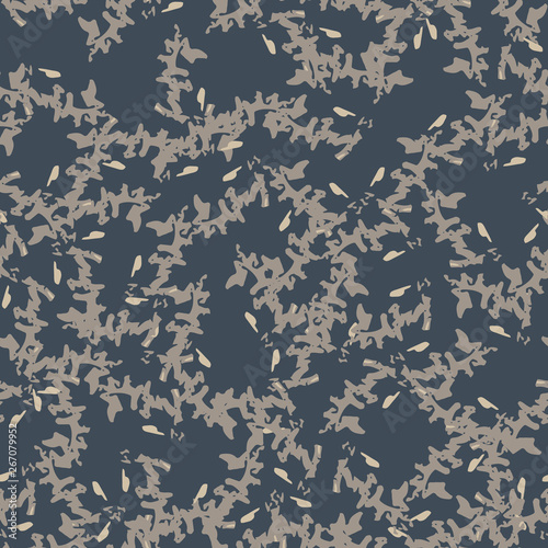 Urban camouflage of various shades of beige, grey and blue colors