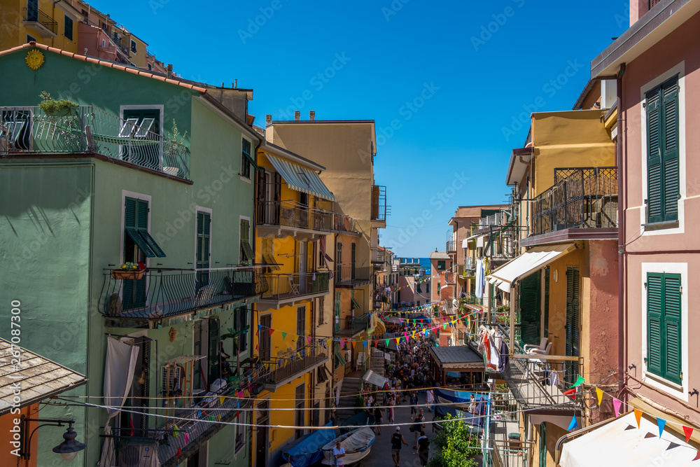 Beautiful streets of Riomaggiore on a sunny day, Cinque Terre, Italia, Liguria