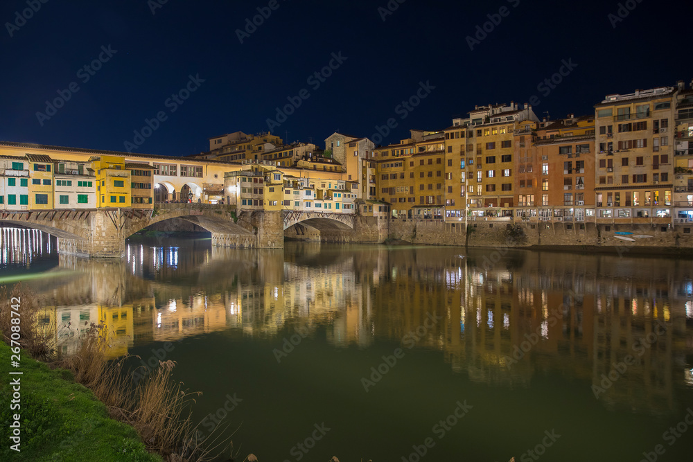 Romantic Night view over the Arno River in Florence with Ponte Vecchio