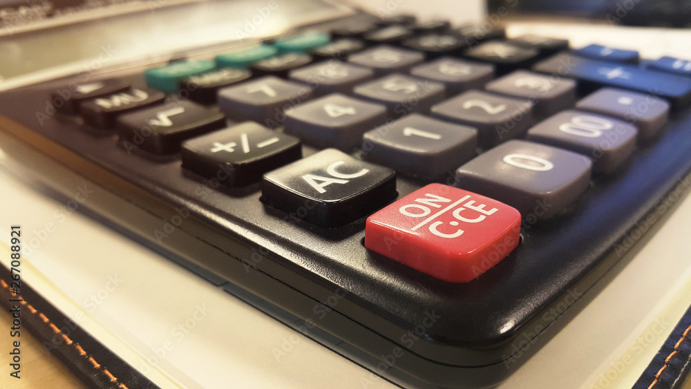 Close-up calculator on notebook Close-up calculator on notebook