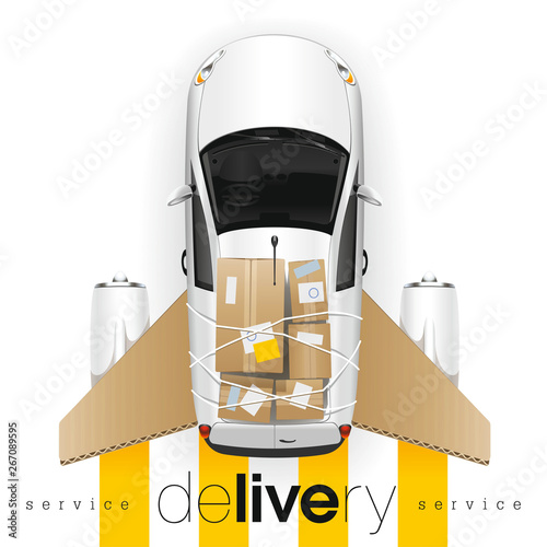 Completely loaded white car of the delivery service with cardboard side panels and aviation engines quickly and in time will deliver any freight.
