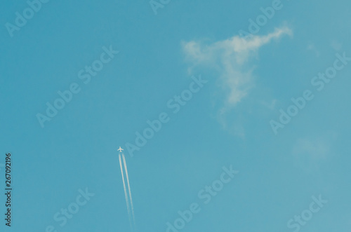 The plane is far in the sky