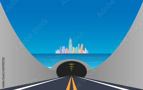 Road in the tunnel under the sea to the city