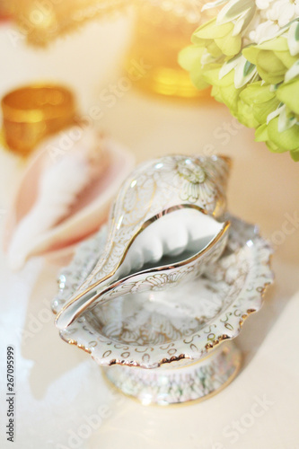 Conch shell on glod tray in tradition Thai wedding ceremony
