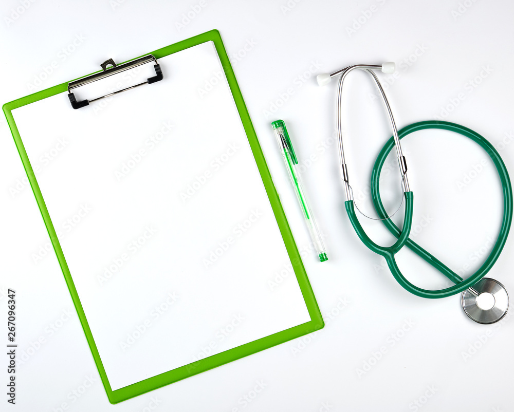 empty white sheets and medical stethoscope on a white background empty white sheets and medical stethoscope on a white background