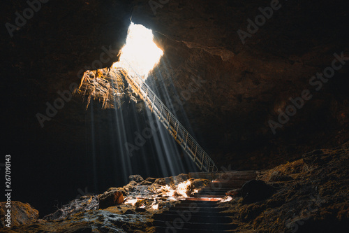 Stairs leading into a cave under the ground.