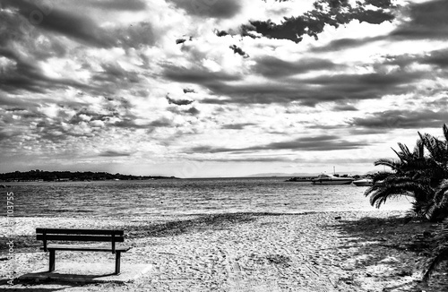 The bench the beach and the horizon