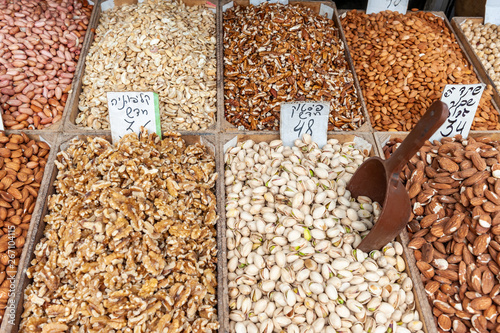Walnuts, pistachios, almonds and other nuts sold in shuk Levinsky market, Tel Aviv, Israel