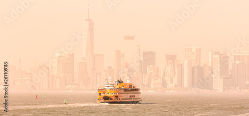 Staten Island Ferry and Lower Manhattan Skyline, New York City, USA.